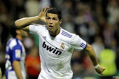 Ronaldo nets twice as 10-man Madrid beat Sociedad 4-3