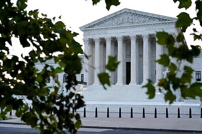 The Latest: Ginsburg Casket Arrives At Supreme Court