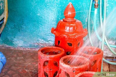 How to Paint Concrete Garden Ornaments