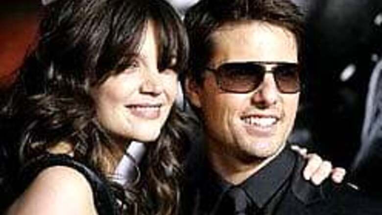Furious Katie defends 'caring' Cruise