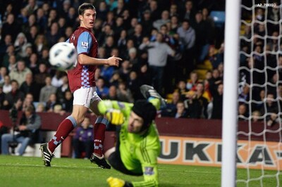 EPL roundup: Arsenal win, Chelsea held