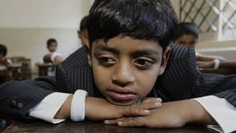 Slumdog star's father asks for more money