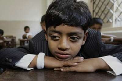 Slumdog star's father asks for more money