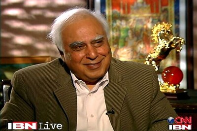 Sibal opposes cartoons on political class in textbooks