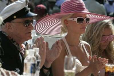 Playboy Hefner to sell empire to Virgin's Branson?