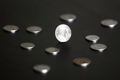 Rupee Rises 12 Paise to 69.71 Against US Dollar in Early Trade