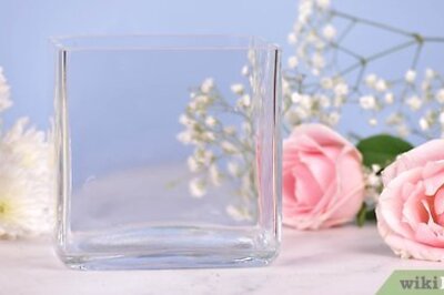 How to Make a Floral Arrangement Using a Foam Block Inside a Container