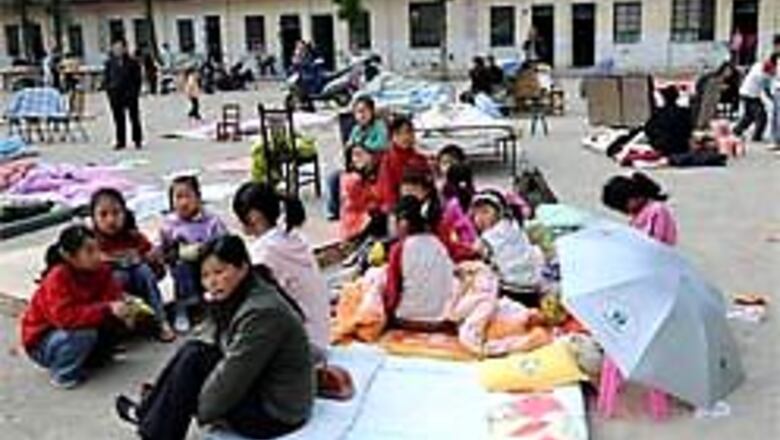 Rain, mudslides hamper relief work in China