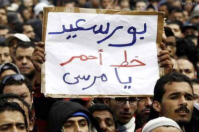 Video of protester stripped and beaten fires Egypt fury