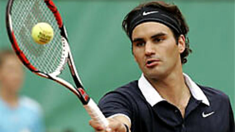 Federer, Safina advance to semi-finals