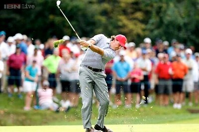 US stay in lead as rain interrupts Presidents Cup