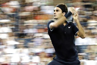 Federer, Serena march on in US Open heat