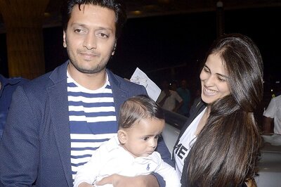 Snapshot: Doting daddy Riteish Deshmukh carries son Riaan through airport as mother Genelia looks on