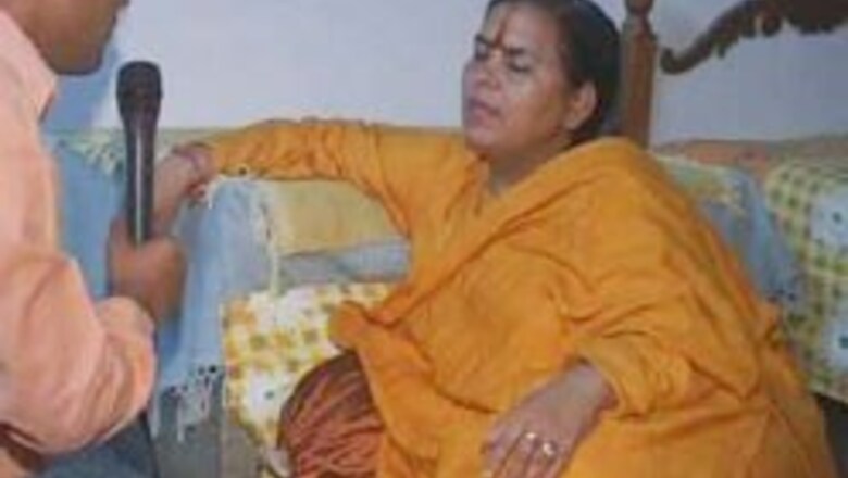 Govindacharya stands by Uma's side