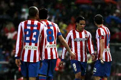 Nine-man Atletico Madrid clinch a draw at Getafe
