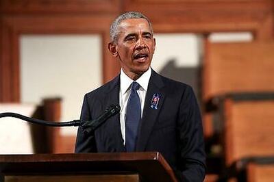 Obama assails Trump as unfit, says Biden will preserve U.S. democracy