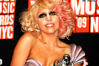 British pop singer Lady GaGa goes topless in promo ad