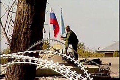 Russia pulls back troops from Georgian territory