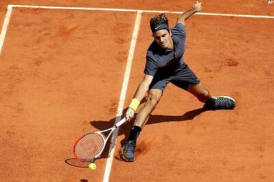 Federer gets record Grand Slam match win