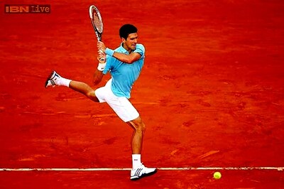 Novak Djokovic beats Marin Cilic to reach French Open fourth round
