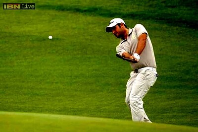 China specialist Levy leads in wet Shanghai