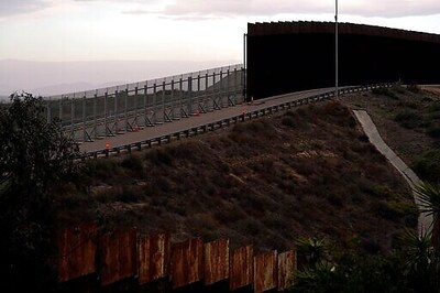 High Court Puts Off Wall, Asylum Cases At Biden's Request