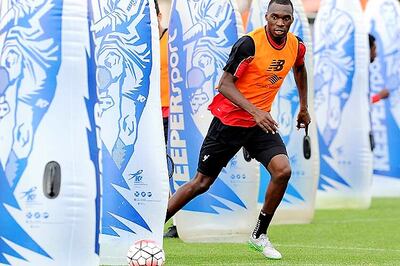 Liverpool's Christian Benteke to undergo scan after hamstring injury