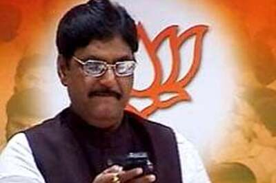 Munde back in BJP fold, party sacks his rival