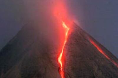 Spiritual keeper prays to calm volcano