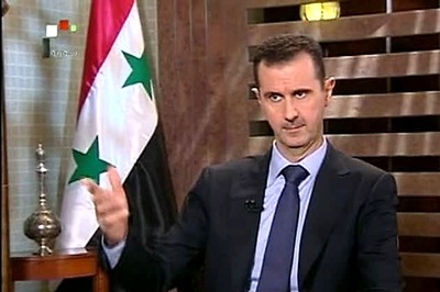 Syria's Assad makes rare public appearance