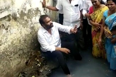 AP: YSRCP MLA Sits in Drain to Protest Against Negligence of Civic Authorities