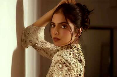 Actress Malavika Mohanan Slays Western Look In White Embroidered Dress