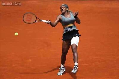Sharapova through in Madrid as injured Serena withdraws