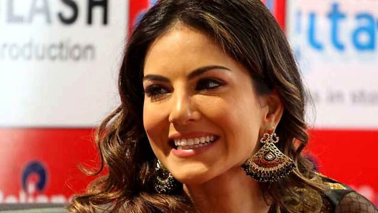 Snapshot: Sunny Leone charms Ahmedabad in a black and gold saree