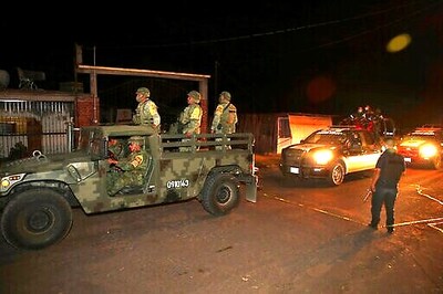 Mexico Charges 3, Detains 25 In Ambush Killing Of 13 Police
