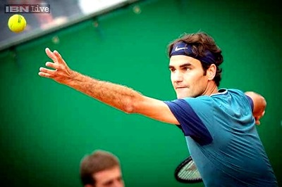Federer suffers early defeat in Rome, Nadal survives