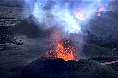 MH370 hunt: Missing plane draws eyes to land of molten lava and killer sharks