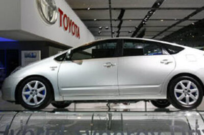 Toyota plans $1 billion marketing, more hybrids