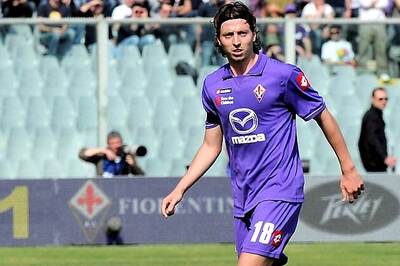 Milan sign midfielders Montolivo, Traore