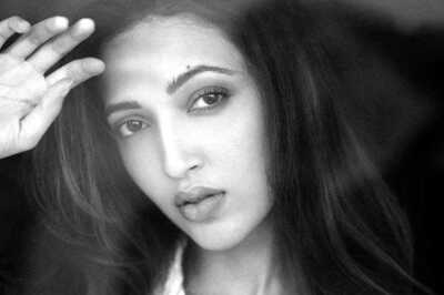 Actress Neha Shetty Weaves Monochrome Magic In Oversized Unbuttoned Shirt