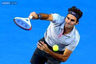 Federer helped by Gasquet's loss at Swiss Indoors