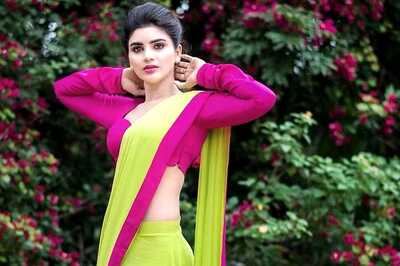 Actress Varsha’s Dual-coloured Bright Saree Is A Breath Of Fresh Air
