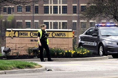 Officer Dies After Shot in Police Car in Kansas