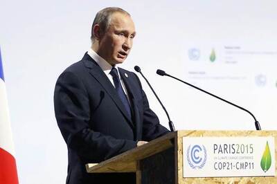 Putin snubs Erdogan in Paris as pilot's body returns to Russia