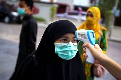 Haj pilgrims keep distance at usually crowded stone the devil ritual