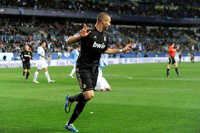 Benzema on target as Real enter quarters