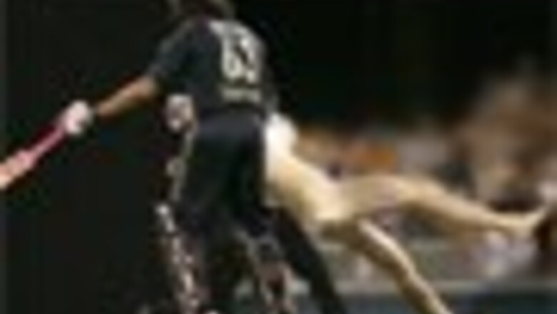 In Pics: Andrew Symonds grounds a streaker