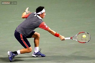 Kei Nishikori wins, Roger Federer advances at ATP Finals