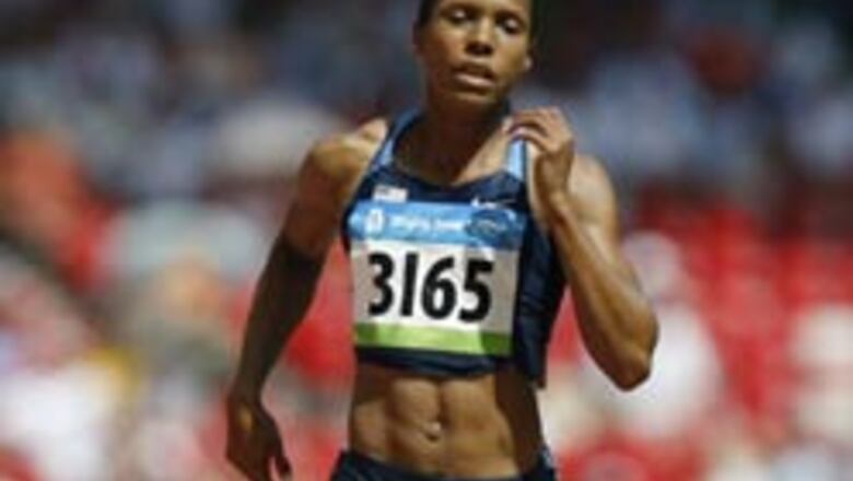 Favourites advance with ease in women's 100m
