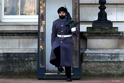Sikh soldier parades outside Buckingham palace in a turban